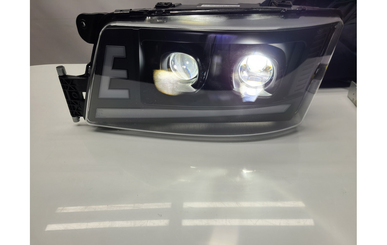 Фара MAN TGX, TGS LED DRL Левая